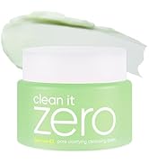 Text reads 'clean it zero'. Green-tinted jar of skincare product with white lid and cream-colored product visible on top.