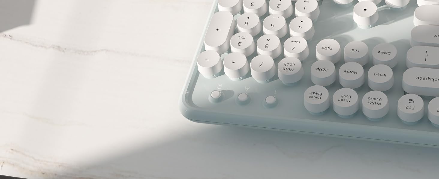 green white wireless keyboard and mouse