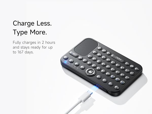 Silver mini keyboard being charged with Type-C cable showing long standby battery feature