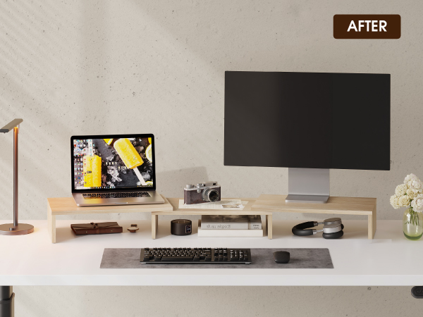 Modern minimalist entertainment setup showing wall-mounted flat screen TV above white media console. Clean, organized desk arrangement with computing equipment.