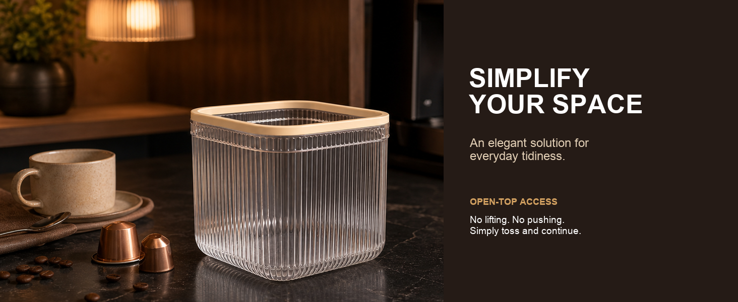 Clear open-top mini trash can at a warm home coffee station