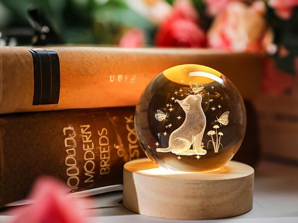 2.3IN CRYSTAL BALL FIGURINES