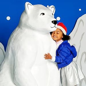 child hugging polar bear