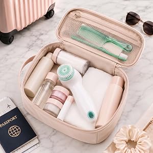 Conair True Glow facial cleansing brush packed in a pink travel toiletry bag