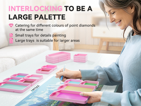 Text reads 'INTERLOCKING TO BE A LARGE PALETTE'. Shows pink organizational trays with text about combining paint diamonds and tray sizes for detailed painting.