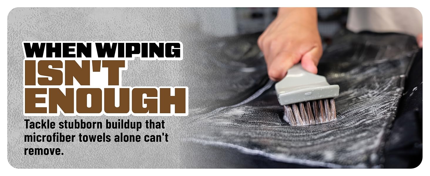 Dense bristles dig into perforations and piping while the handle keeps hands clean.