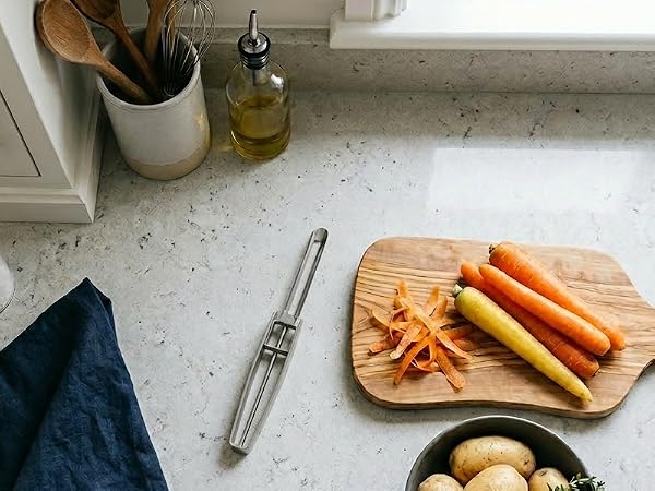 Carrots on a cutting board in a bright kitchen