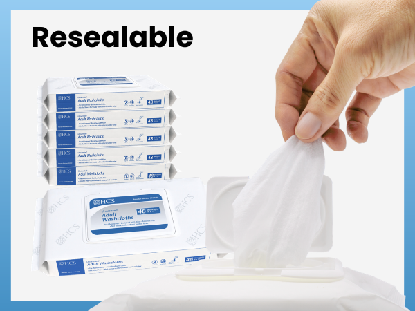 Showing someone removing a wipe from the resealable, flip-top packaging which keeps wipes moist
