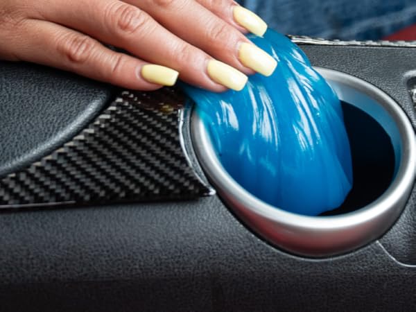 Detailing gel pressed into cupholder edges to pull out embedded dirt and particles