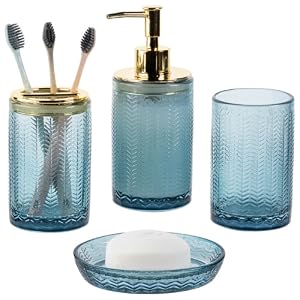 4 piece bathroom accessories set with transparent blue glass finish and brass accents