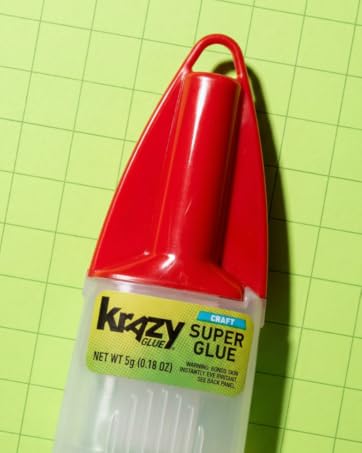 Krazy Glue Craft Super Glue bottle with red brush applicator cap for detailed crafting and repairs