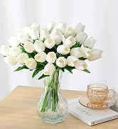 white fake tulips on the table