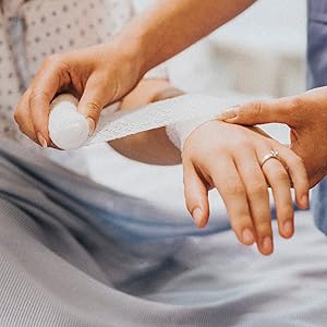 injured arm gauze wrapping