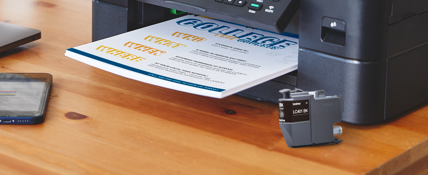 LC401 ink cartridge in front of Brother printer