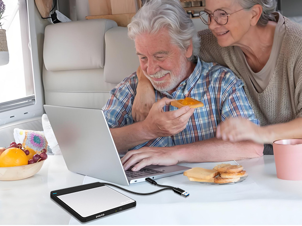 This external disk drive for pc is easy to use on your travels to play DVDs and burn videos.