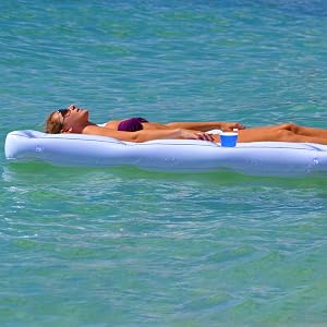pool lounge floating beer pong table