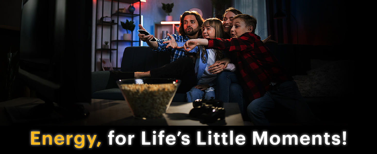 A scene showing a family enjoying TV time on the couch, using Kodak powered devices