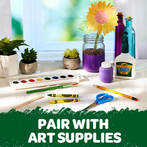 Pair with art supplies, featuring crayola crayons sitting next to crayola art supplies