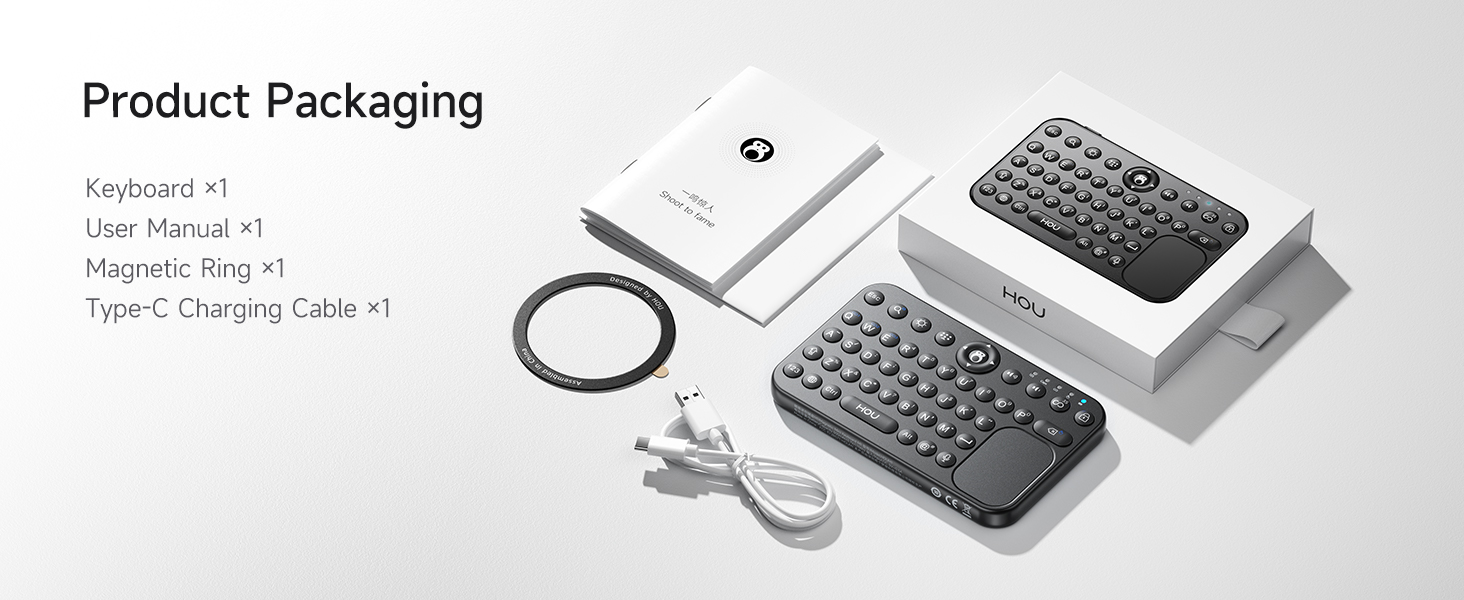 Packing list showing keyboard, manual, magnetic ring and charging cable