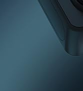 Close-up of teal or dark blue-green fabric or material surface with subtle texture and lighting variation.