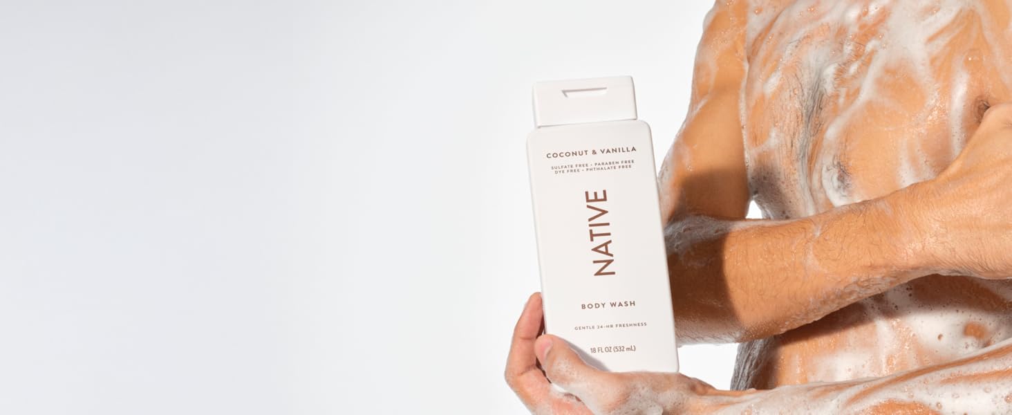 Native's coconut and vanilla sulfate-free bodywash shown in use on a man with rich creamy suds