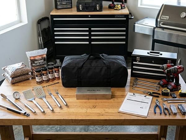 52L bag placed on a rugged workbench, surrounded by professional tools and BBQ gear.