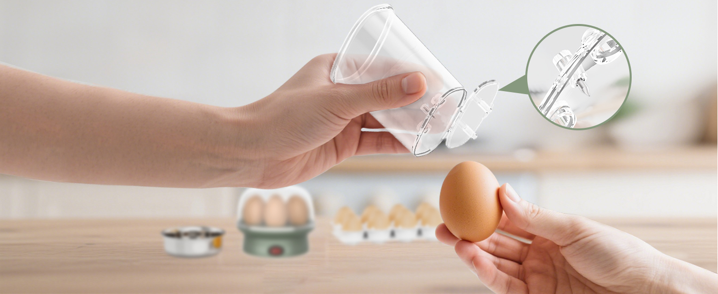 Hands demonstrating egg separator tool. Clear plastic butterfly-shaped device separates yolk from white. Egg carton and ceramic egg holder visible in background.