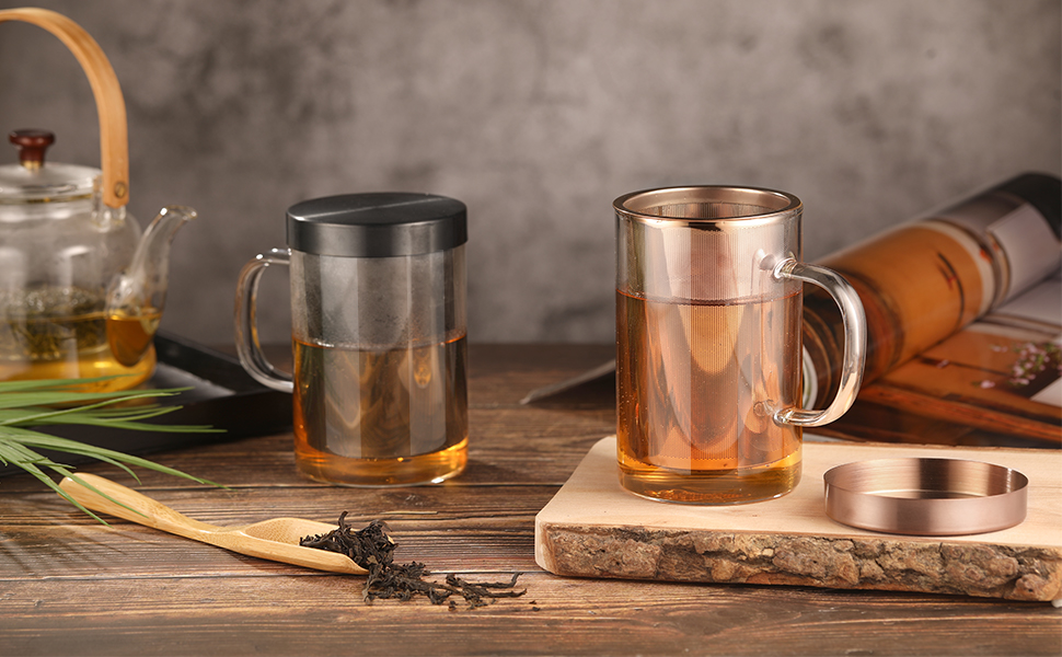 a set of two mugs with a tea cup and a tea cup