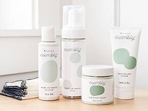 Esembly Skincare sitting on a wooden table
