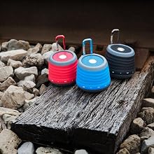 Clips onto a backpack.
