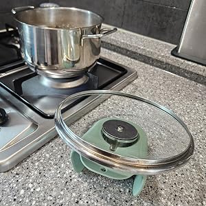 pot lid holder on countertop, kitchen lid rest, drip catching lid holder, cooking accessory
