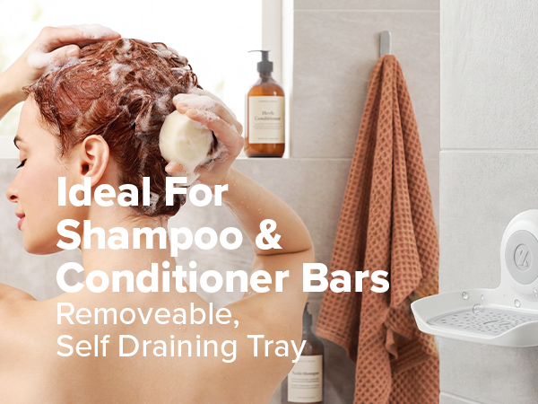 woman washing her hair with soap bar