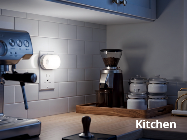Dimmable plug-in night light illuminating a kitchen counter.