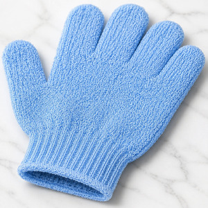 Close view of the medium-texture weave on a blue exfoliating glove