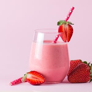 Smoothie drink made with fresh strawberries using a personal blender