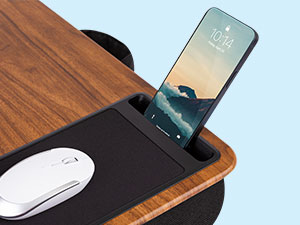 a close up image of the phone slot on the home office pro lap desk