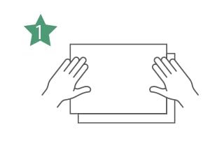 Simple line drawing instruction diagram showing two hands holding or positioning a rectangular object.