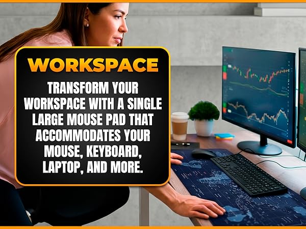 Large mouse pad covering office desk with keyboard, mouse, and dual monitors