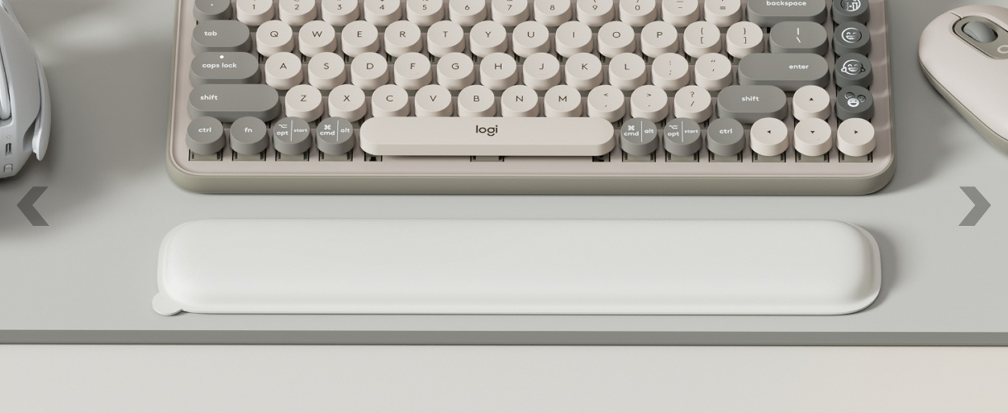 pop keys mist sitting on logitech desk mat extended mid gray mouse pad