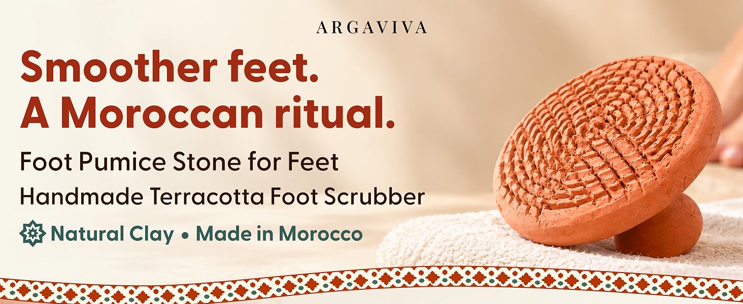 Argaviva terracotta foot scrubber with a textured face resting on a towel