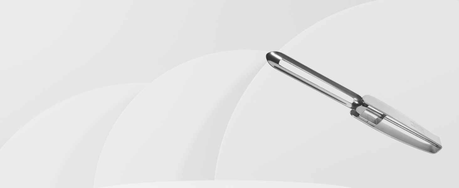 Close-up of a stainless steel peeler