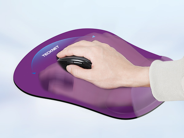 a hand holding a mouse on a mouse pad