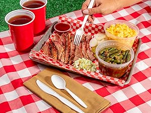 Fork about to pick up a piece of BBQ.