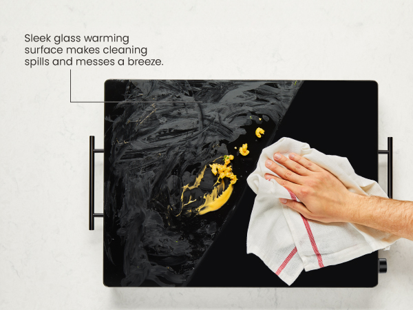 Nonstick glass warming surface makes cleaning spills and messes a breeze