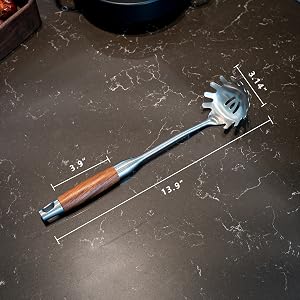 spaghetti server utensil; pasta strainer; spaghetti spoon; pasta spoon