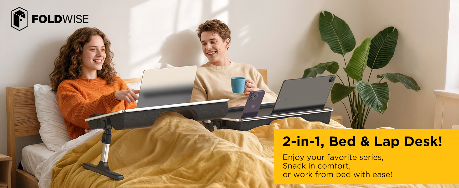 Couple using adjustable bed laptop desk with devices for remote work and leisure in bed