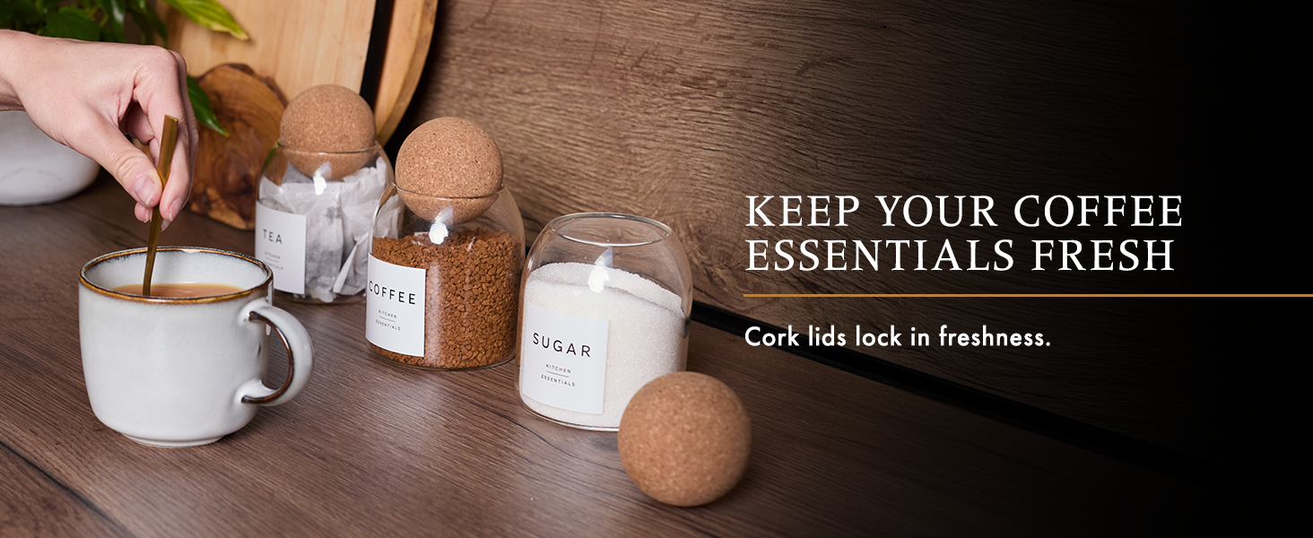 Coffee preparation scene with cork storage containers and white ceramic cups on wooden surface. Text overlay emphasizes keeping coffee essentials fresh.