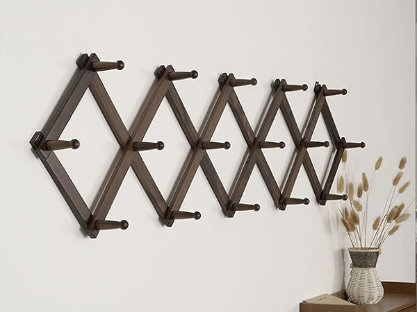 Vintage color diamond shaped wooden hanger on the wall