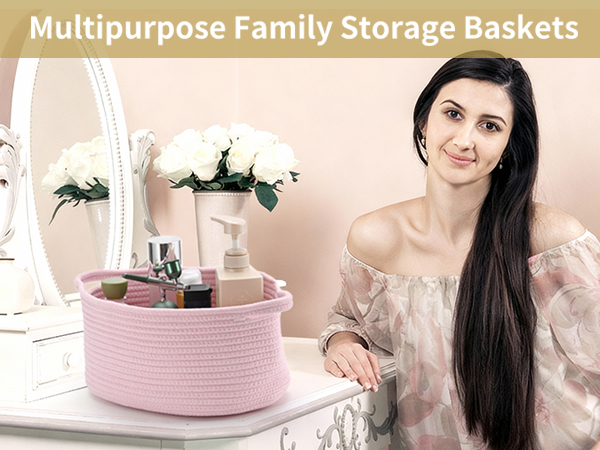 Pink cotton rope storage basket holding skincare products on a vanity table with a woman