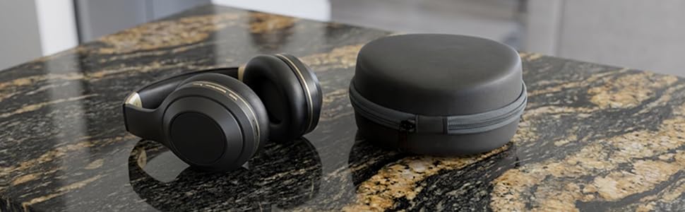 headphone and carry case laying on granite table